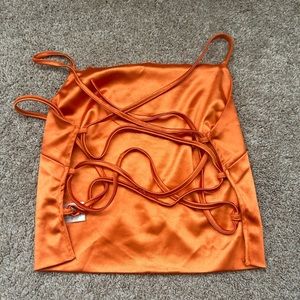 Better Be orange tank top, backless detailing size small